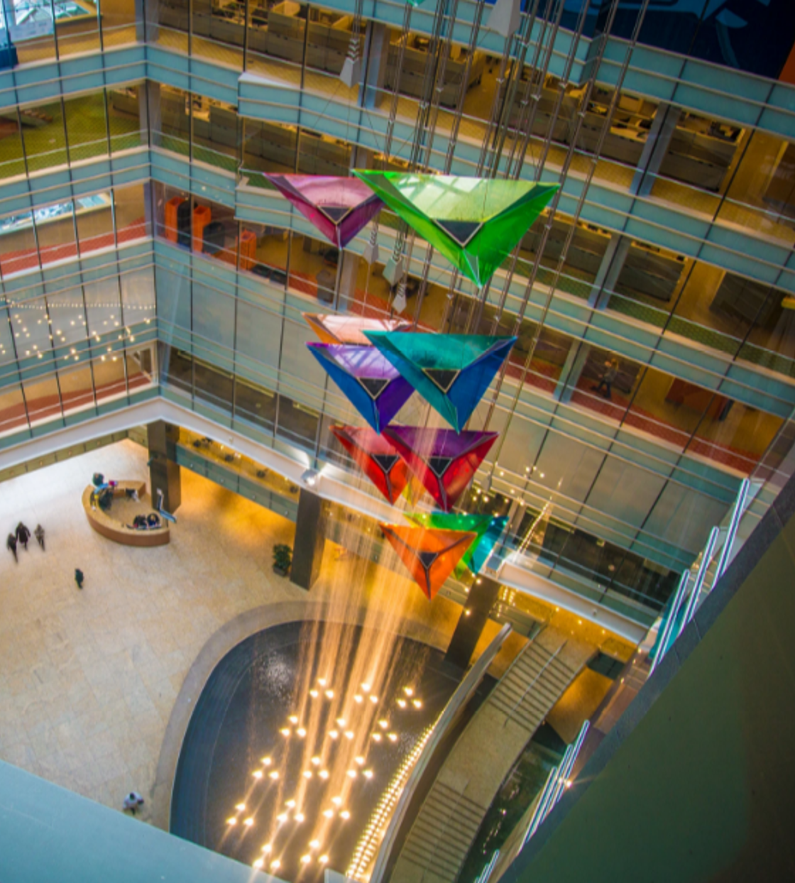 The lobby of the One Campus Martius building in Detroit, where Rocket Companies is headquartered, features a large, hanging water feature that looks like colorful kites.